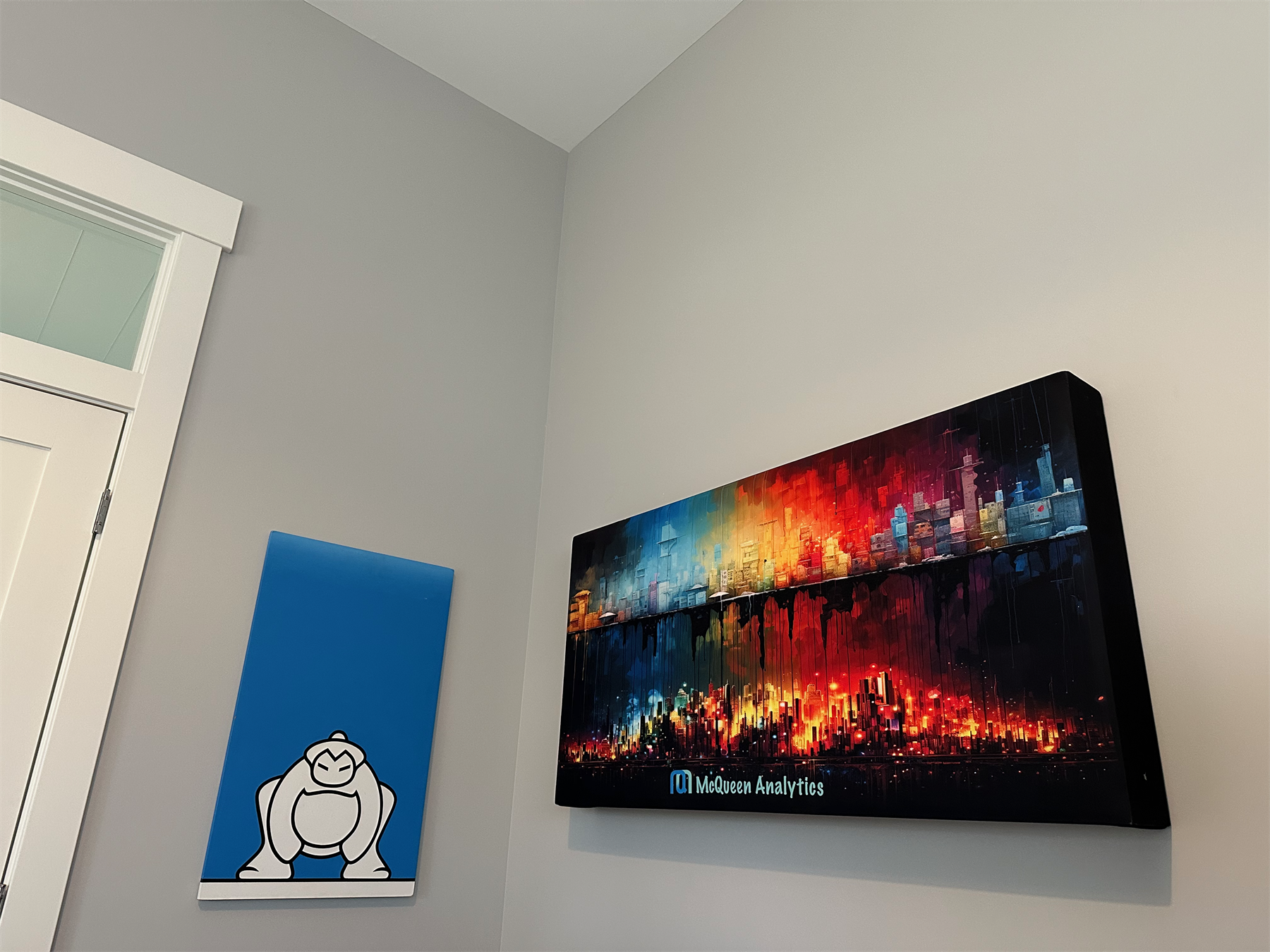 A framed AI artwork printed and displayed on a home wall, showing the physical memory of the early image-generation era.